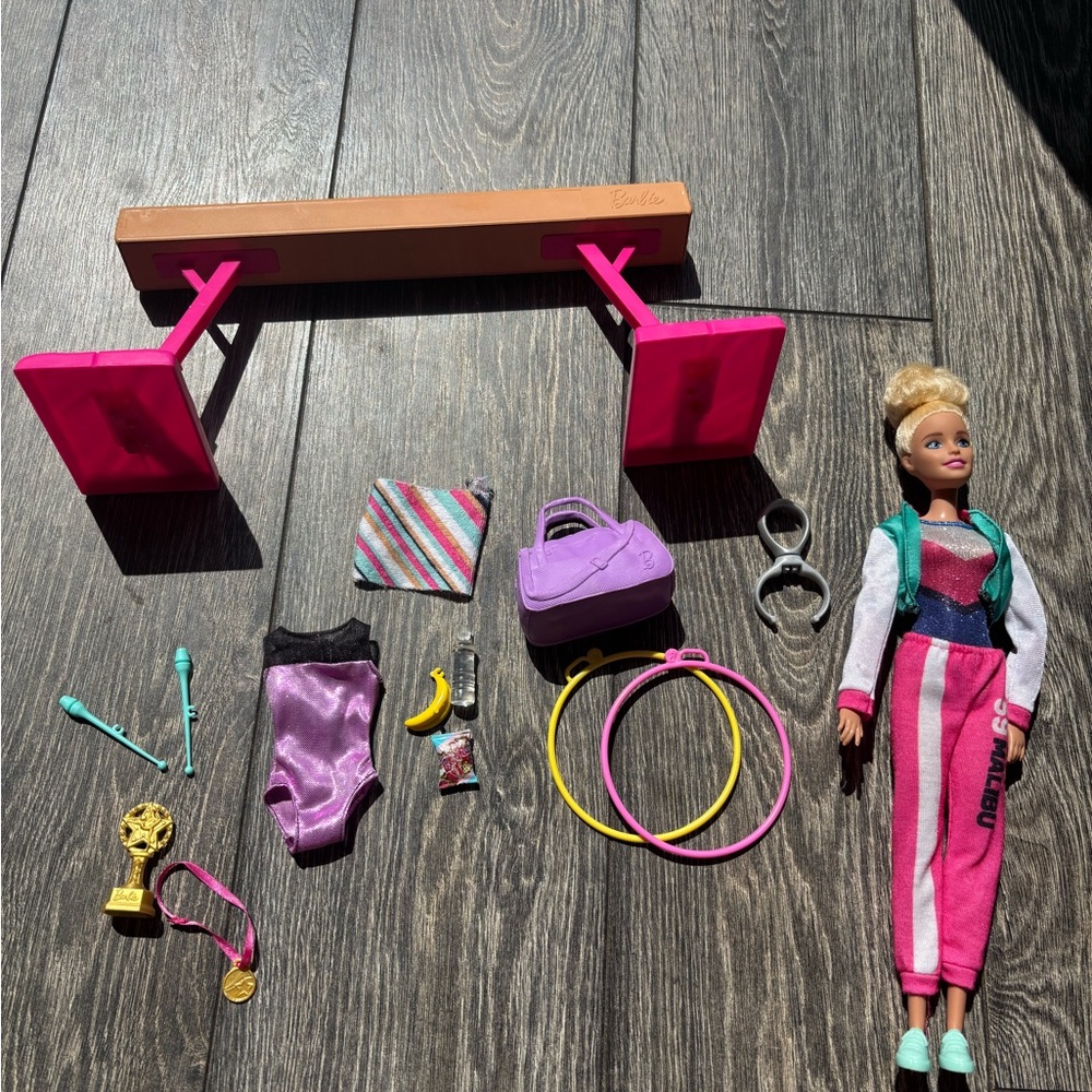 Barbie Beam Gymnastics Set with flexible Barbie and various accessories!